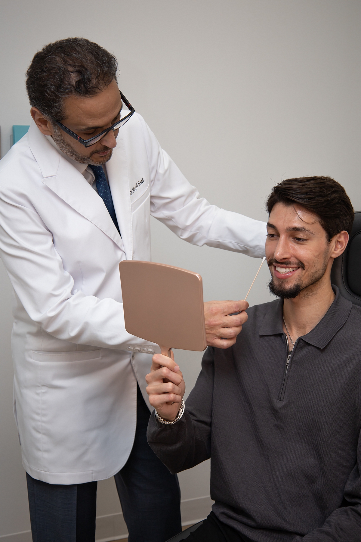 Patient consultation with Dr. Saad at Healing Aesthetics